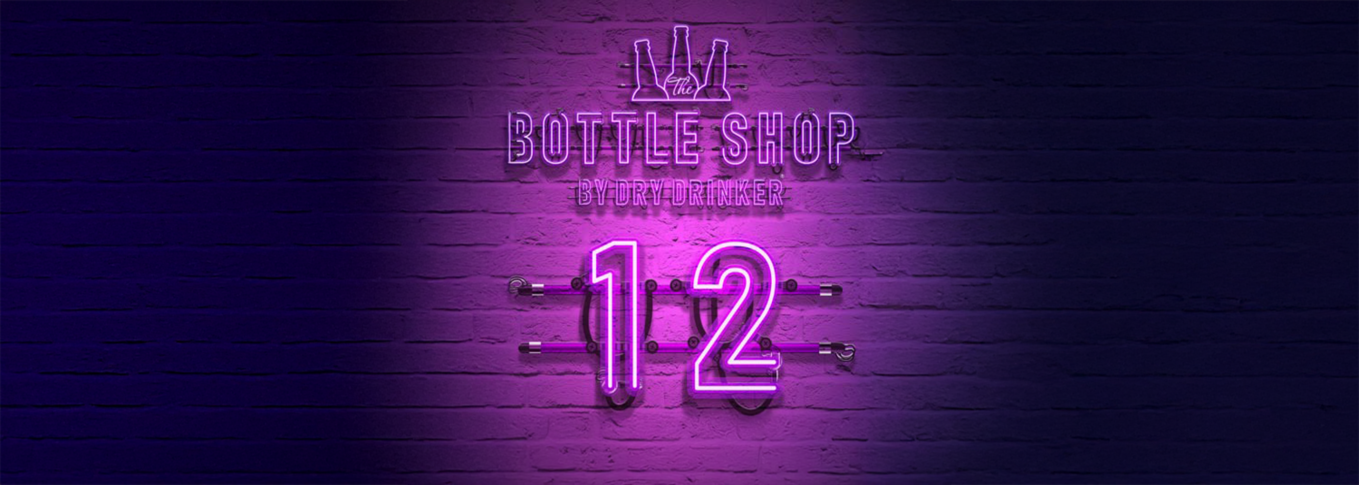 Neon sign for a bottle shop with the number 12 on a dark brick wall background.